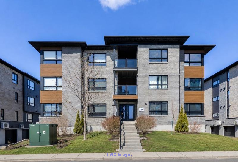 Condo 4 1/2 moderne, 2 stationnements, La Prairie